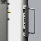 Close-up of a secure metal door handle and locking mechanism, partially open, with a blurred background and visible bolts on the door edge.