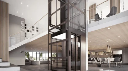Modern open-plan interior with a glass elevator at the center, a staircase, and a mezzanine level labeled "Library." Dining and lounge areas are visible on the ground floor.